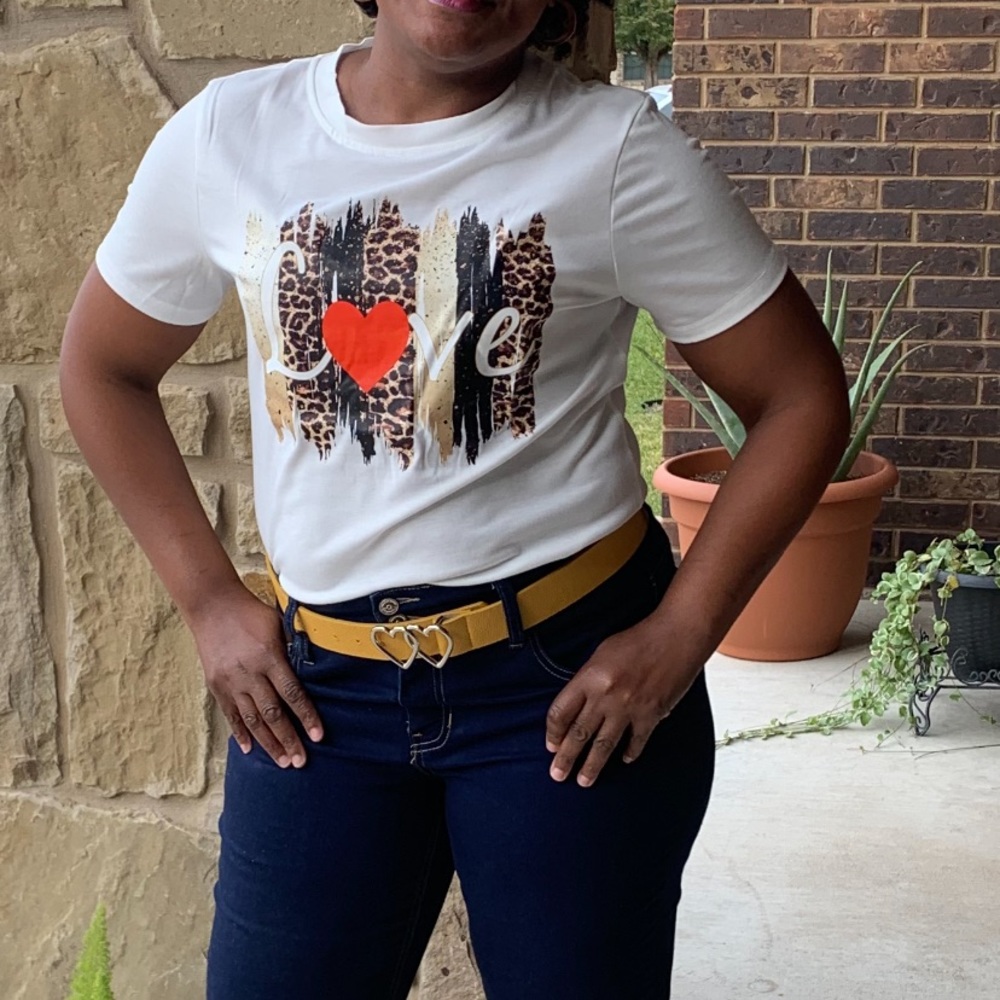 White tee with animal print and heart logo